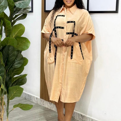 Chemisier oversize pour femmes avec des détails tendance et des bretelles contrastées Chic und Stil