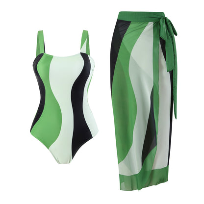 Maillot de bain une pièce pour femmes avec jupe portefeuille à la mode et motif à vagues graphiques Chic und Stil