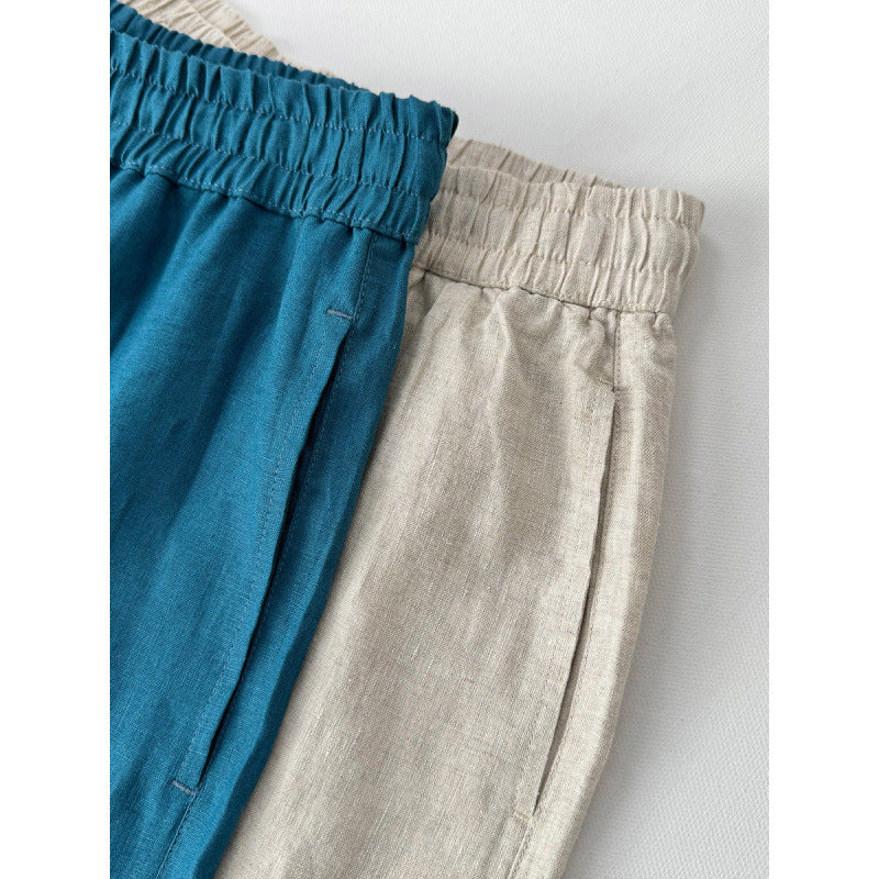 Casual linen pants for women with elastic waist and side pockets with openings.