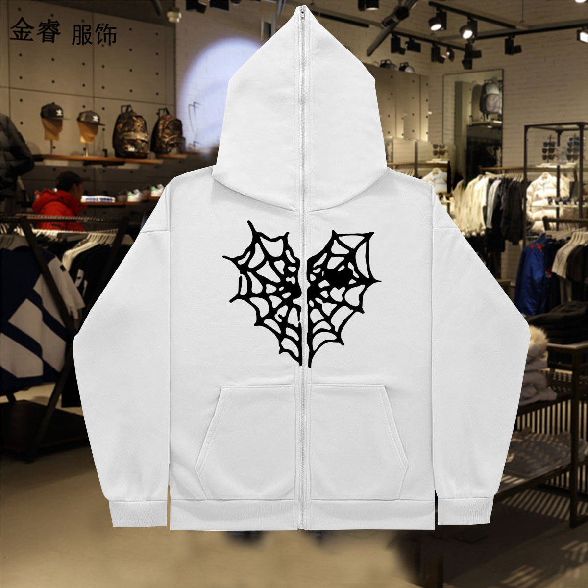 Dame Hoodie avec un design de toile d'araignée saisissant Chic und Stil