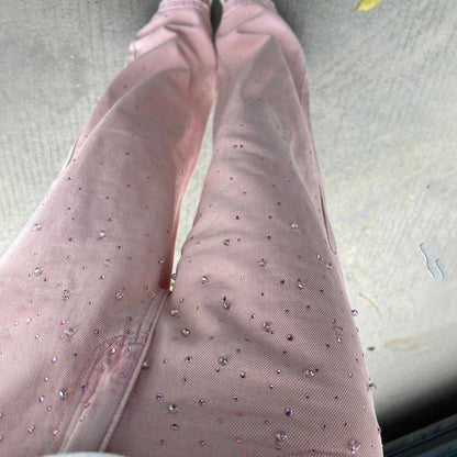 Women's denim pants with elegant pearl embellishments and a trendy cut Chic und Stil