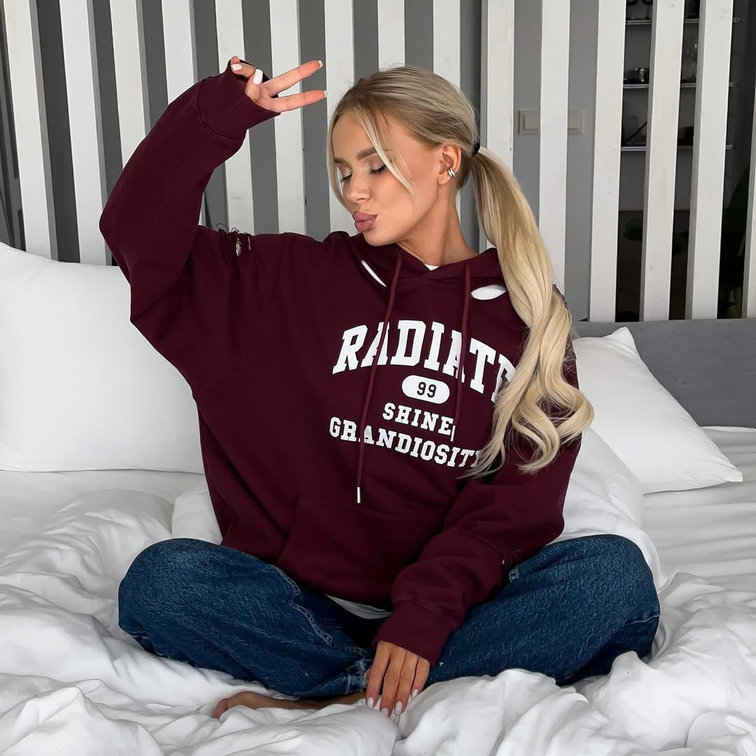 Pull à capuche oversize pour femmes avec des détails de déchirure tendance Chic und Stil