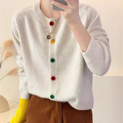 Women's playful knit vest with colorful button details Chic and Stil