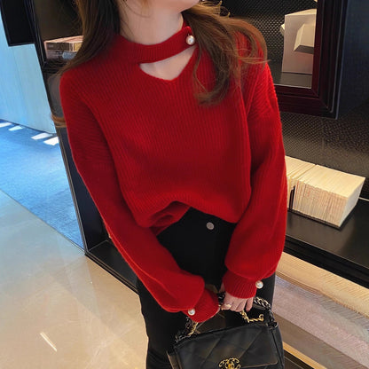 Pull en tricot pour femmes avec un look cut-out raffiné et des manches ornées de perles Chic und Stil