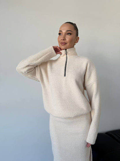 Femme pull en tricot à la mode avec fermeture éclair courte Chic und Stil