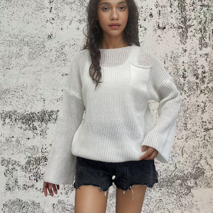 Sweat à col rond tricoté en gros mailles pour femmes avec une coupe décontractée et une poche pratique Chic und Stil