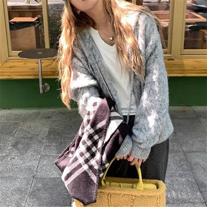 Dames cardigan douillet avec des manches larges et une fine texture Chic und Stil