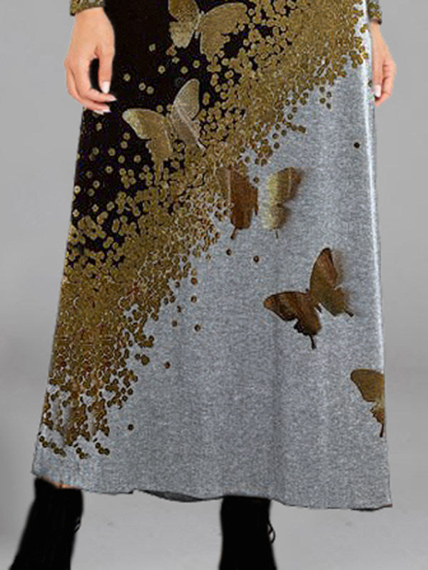 Robe maxi femme avec un motif de papillon artistique et des accents élégants Chic und Stil