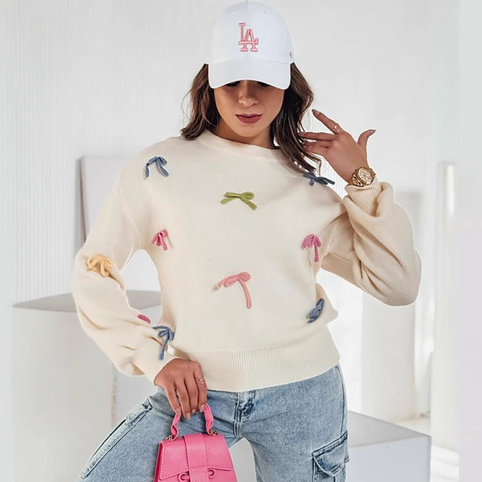 Pull en tricot pour femmes avec des appliques de nœuds ludiques et une coupe décontractée Chic und Stil