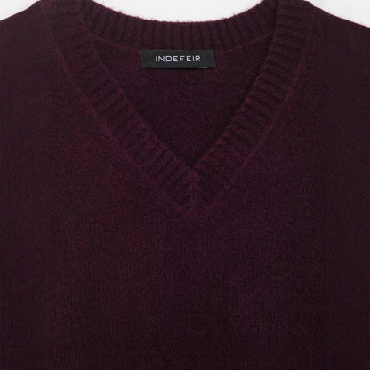 Pull femme à col en V en matériau tricot doux Chic und Stil