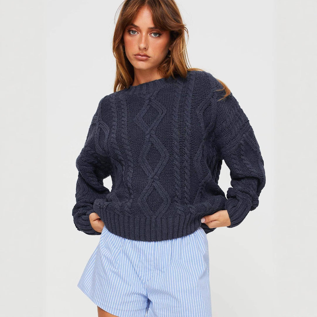 Pull femme en grosse maille avec des manches volumineuses et un motif torsadé classique Chic und Stil