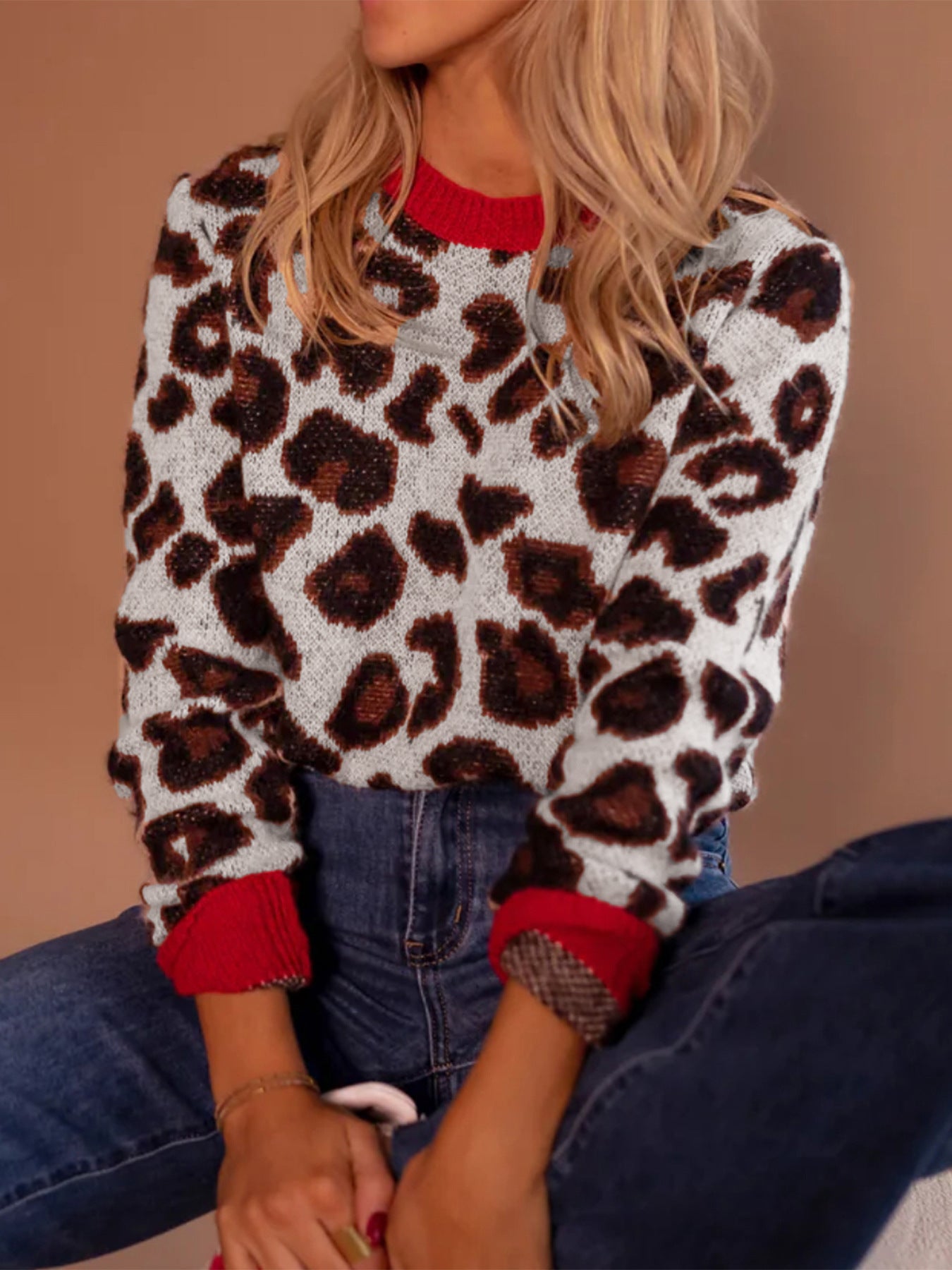 Pull femme à motif léopard et emmanchures contrastantes Chic und Stil