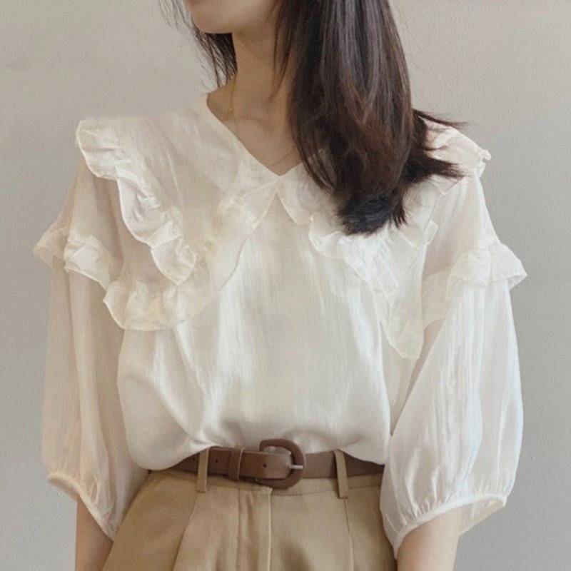 Elegant ruffled blouse set and fitted shorts Chic and Style