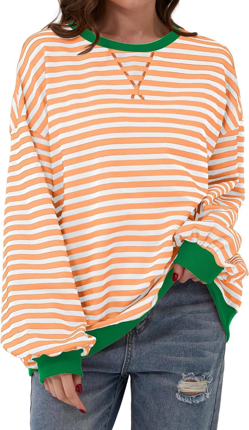 Femme pull décontracté avec motif rayé saisissant et bords élastiques Chic und Stil