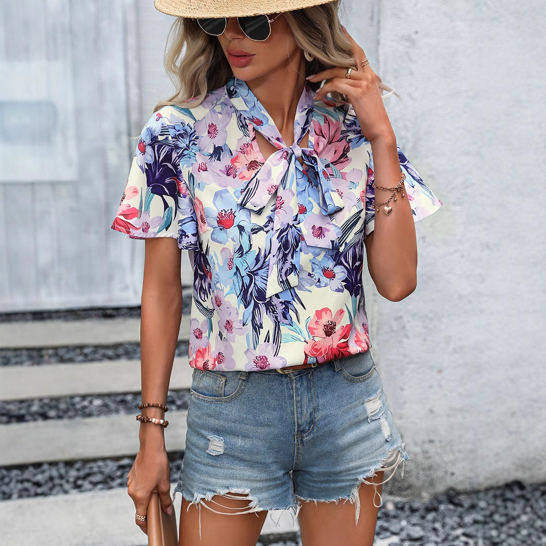 Chemisier femme avec motif à boucles et fleurs Chic und Stil