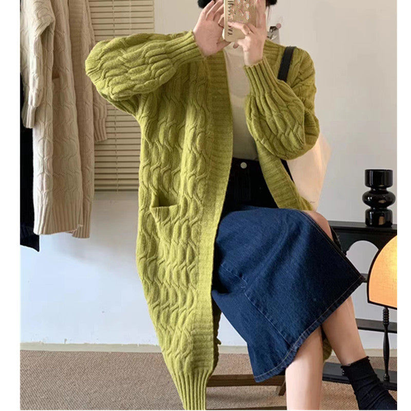 Cardigan en tricot pour femmes avec motif en relief et poches pratiques Chic und Stil