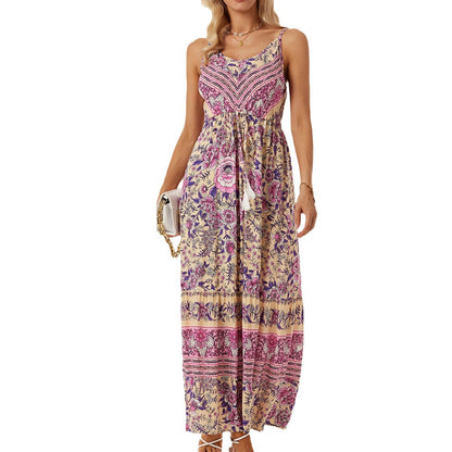 Robe maxi aérienne pour femmes avec un design floral ludique et un tirage à la taille Chic und Stil