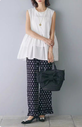 Dames Haut en peplum fluide et ensemble pantalon à pois Chic und Stil