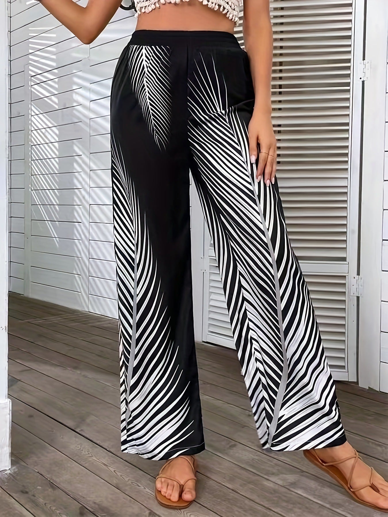 Elegant and lightweight palazzo pants for women with palm tree pattern Chic and Style