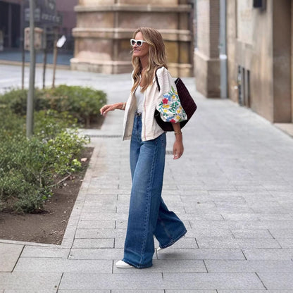 Chemisier tendance pour femmes avec broderies florales et ceinture à la taille Chic und Stil