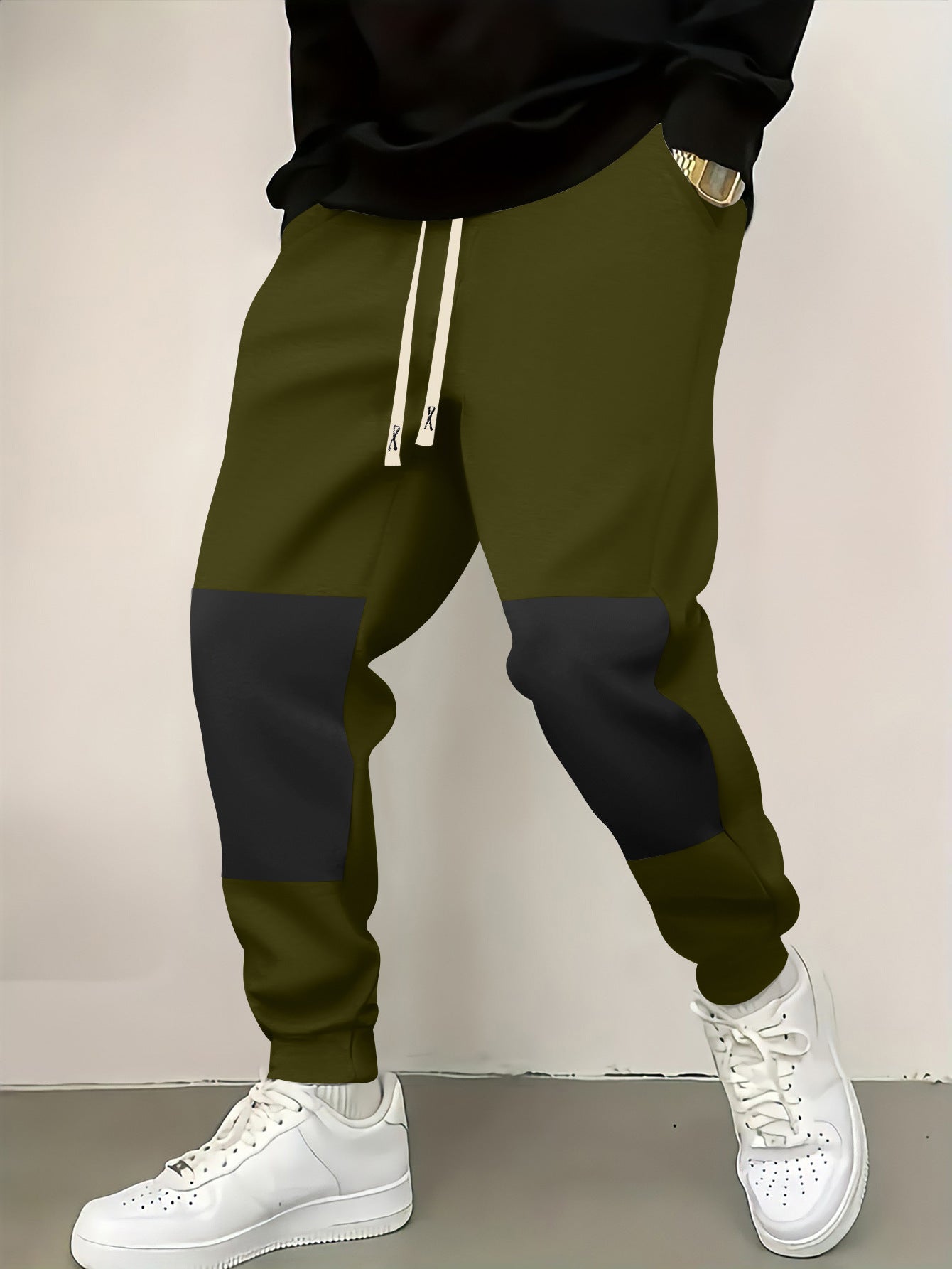 Chic and stylish men's athletic pants with modern color-block elements