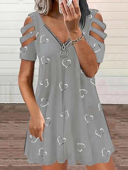 Robe de loisirs pour dames avec des manches à découpe et un motif en forme de cœur Chic und Stil