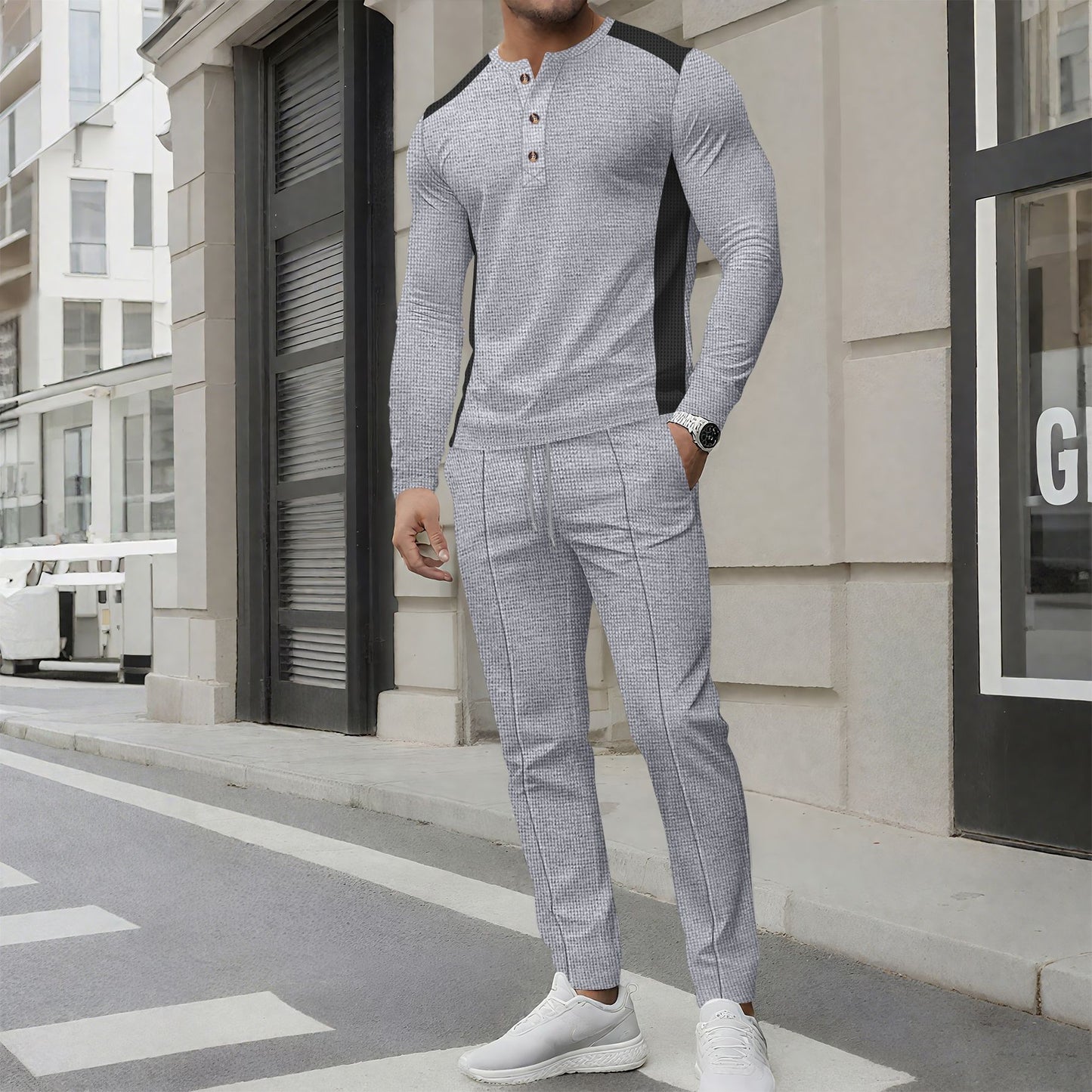 Costume de loisirs pour hommes avec un élégant haut Henley et un pantalon de jogging confortable Chic und Stil