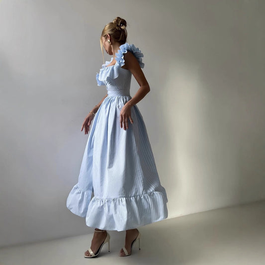 Robe d'été à volants pour femmes avec détails de boutons et jupe ample Chic und Stil