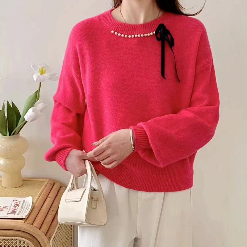 Dames pull mode avec bande décorative et détails en perles Chic und Stil