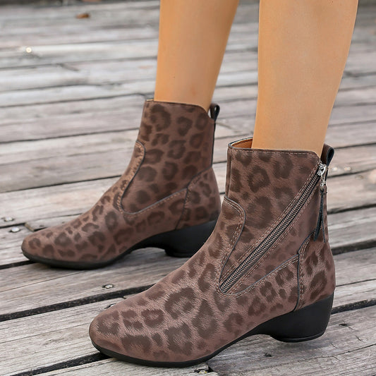 Bottes élégantes pour femmes au design animalier avec fermeture éclair latérale Chic und Stil