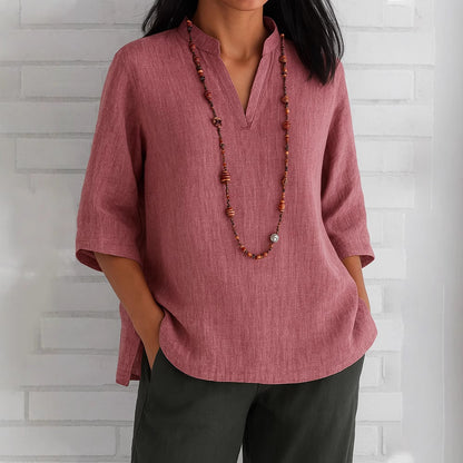 Blouse décontractée pour femmes avec décolleté en V et poches latérales Chic und Stil