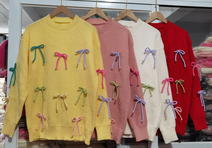 Pull décontracté pour femmes avec des appliqués de nœuds ludiques Chic und Stil