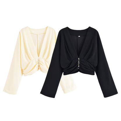 Dames haut élégant avec décolleté en V profond et design de ruché raffiné Chic und Stil