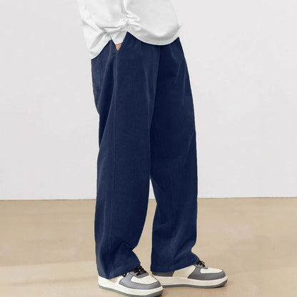 Wide corduroy pants for men with elastic waistband and practical side pockets Chic and Style