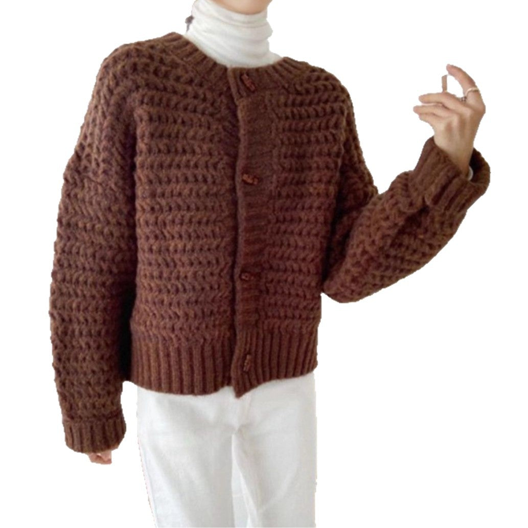 Pull en gros tricot pour femmes avec patte de boutonnage décorative et motif en nid d'abeille Chic und Stil