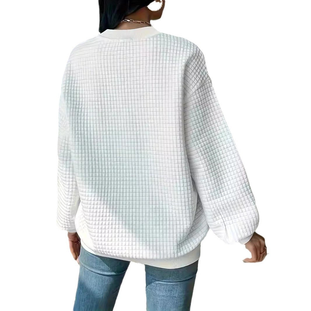 Pull femme avec design en gaufre texturé et coupe décontractée Chic und Stil