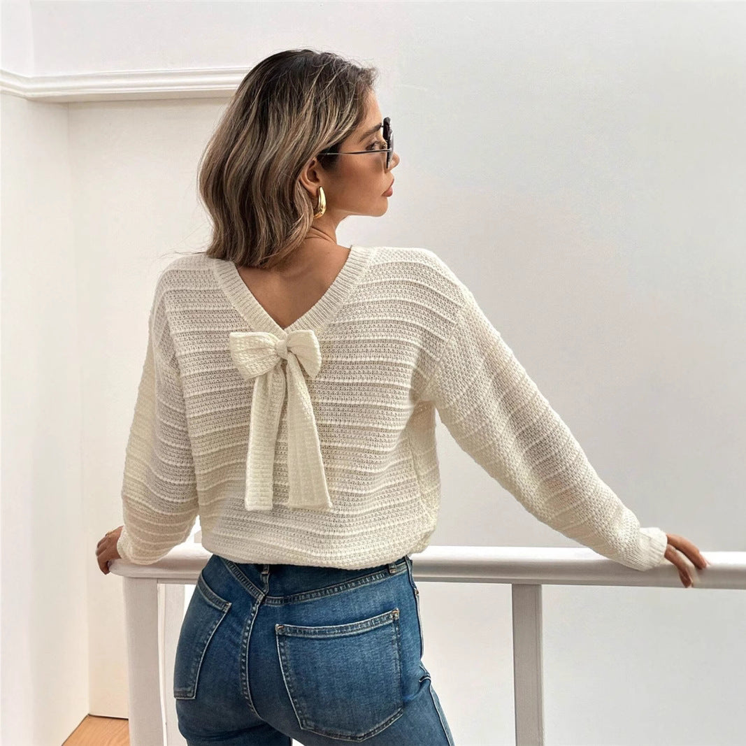 Pull femme en tricot à col en V avec élément décoratif de nœud Chic und Stil