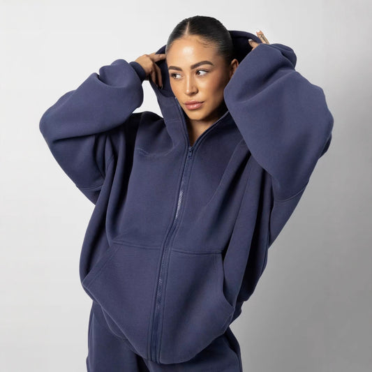 Femmes pull à capuche oversized à la mode avec pantalon de jogging assorti Chic und Stil