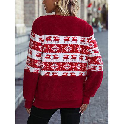 Pull femme douillet de Noël avec surface en flanelle et design festif Chic und Stil