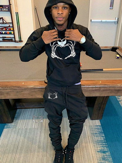 Women's hoodie and jogger pants set with spooky skeleton pattern Chic and Style