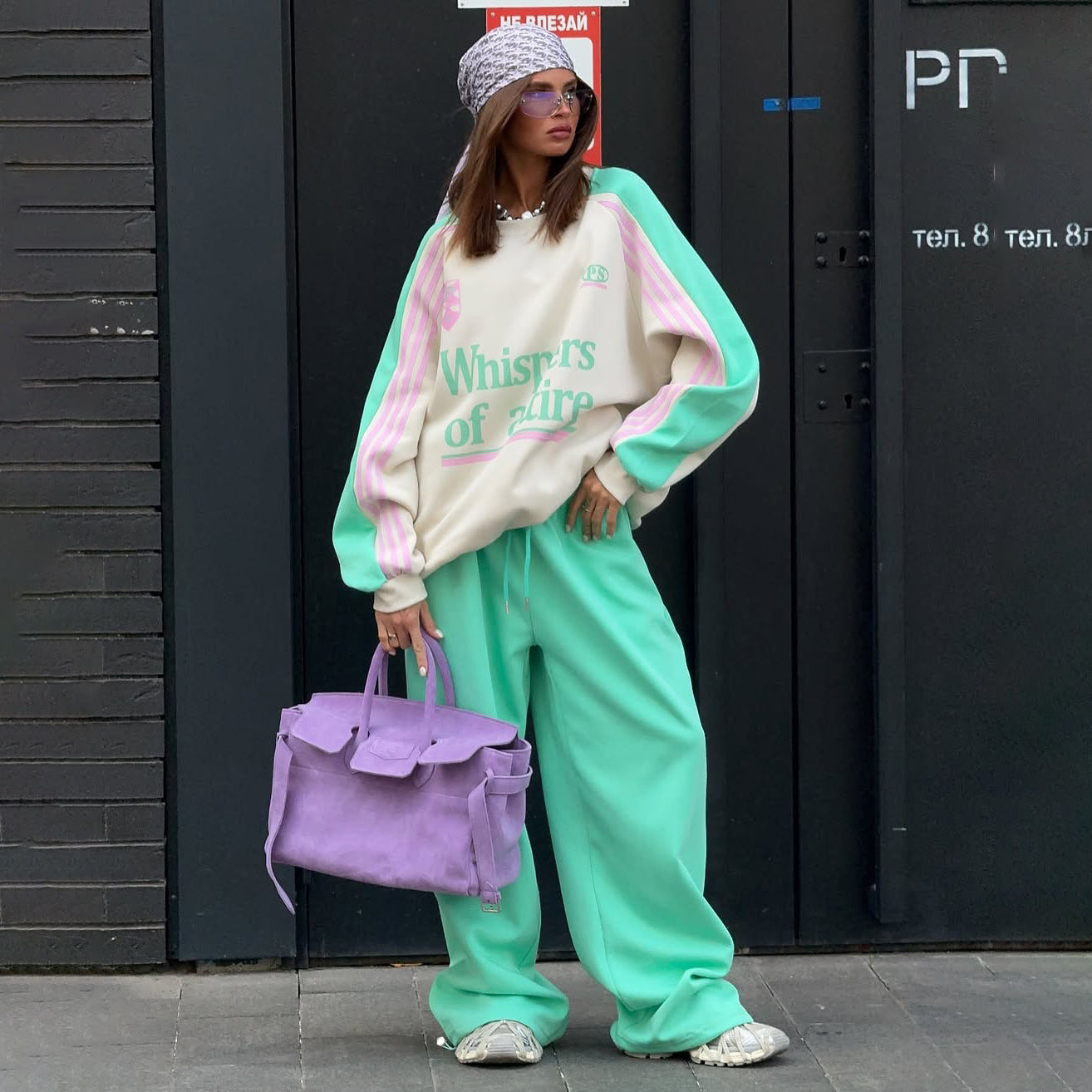 Ladies Casual Sports Outfit with a Relaxed Sweatshirt and Comfortable Jogging Pants Chic and Style