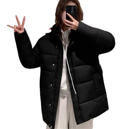 Classic women's down jacket with high collar and practical pockets. Chic and stylish.