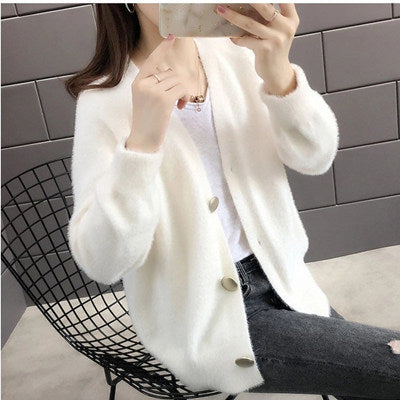 Ladies plush pullover with stylish button details Chic und Stil