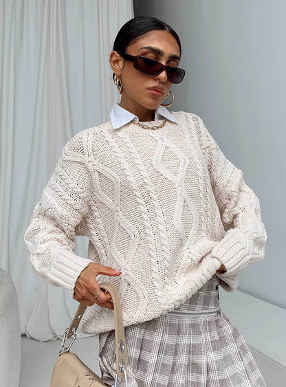 Pull femme en grosse maille avec des manches volumineuses et un motif torsadé classique Chic und Stil