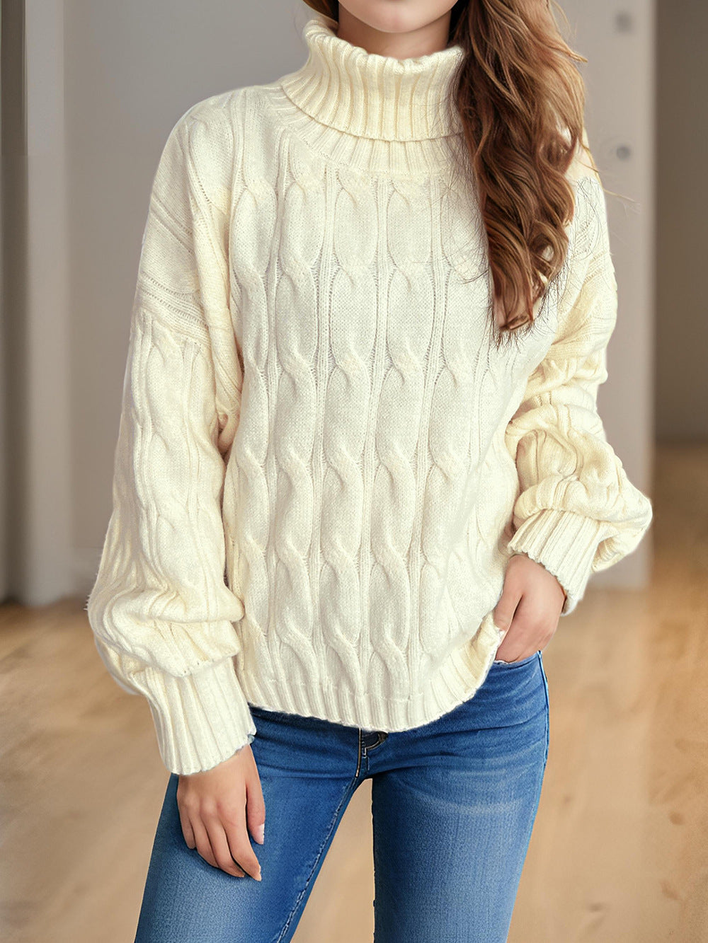 Pull femme en tricot avec col haut et aspect torsadé structuré Chic und Stil