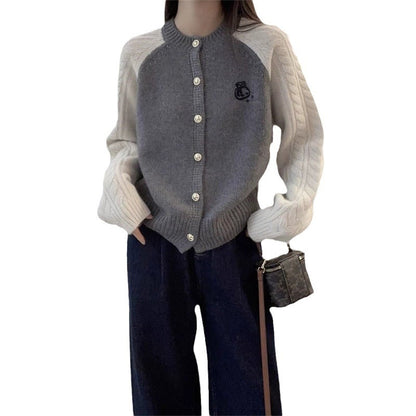 Dames cardigan avec motifs tressés décoratifs Chic und Stil