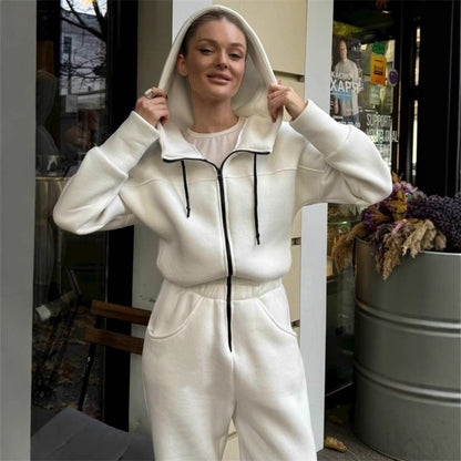 Dames Fleece-Salopette avec capuche et poches pratiques Chic und Stil