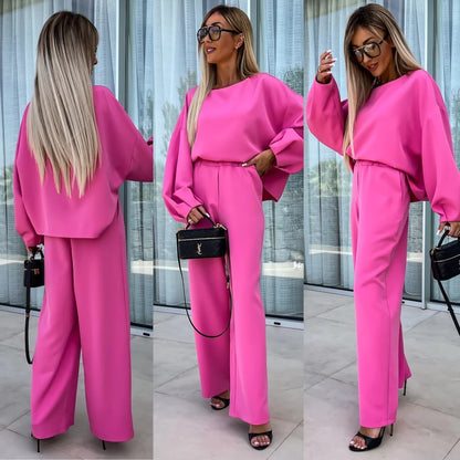 Elegant and modern women's two-piece set with a loose top and chic palazzo pants.