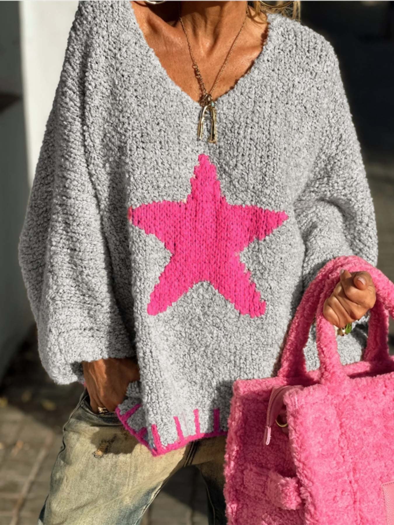 Pull en tricot femme avec col en V et motif étoilé frappant Chic und Stil