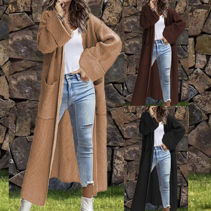 Dames Grand manteau en tricot avec poches et épaules dépassantes Chic und Stil